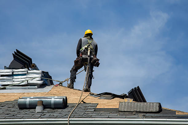 Professional Gutter Installation technician working in Ollie, IA